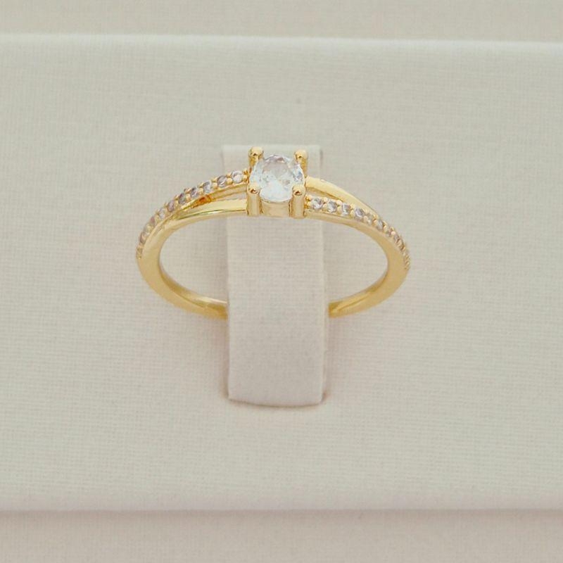 Anel Solitário Transpassado Cravejado